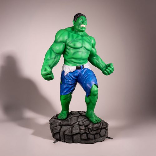 sculpture Hulk en fibre de verre vert musclé style réaliste avec short bleu, décor publicité ou animation commerciale