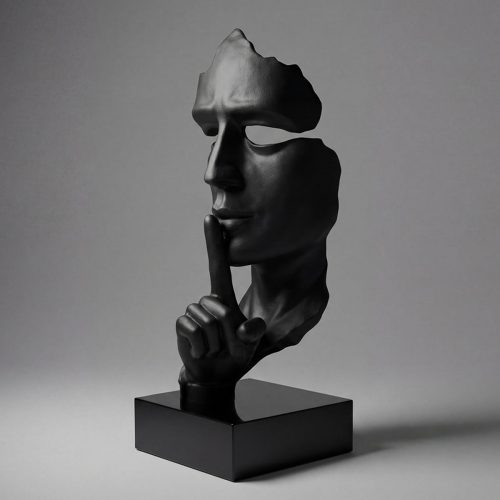 sculpture visage découpé en fibre de verre noir style contemporain avec doigt sur bouche, décoration intérieure ou vitrine
