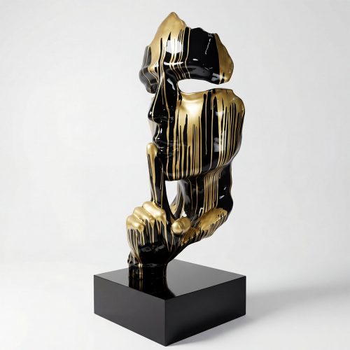 sculpture visage stylisé en fibre de verre noir et doré, style contemporain brillant, usage déco intérieure ou événementiel