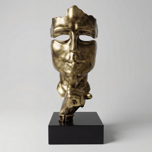 sculpture tête stylisée dorée en stratifié avec doigt sur les lèvres, style artistique contemporain, déco intérieure ou vitrine