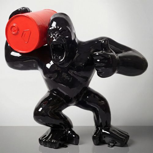 sculpture gorille en fibre de verre noir brillant portant un tonneau rouge style pop art pour déco ou publicité