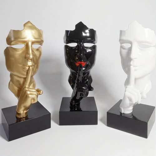 sculpture tête stylisée en fibre de verre noire brillante avec doigt sur les lèvres, style moderne, usage déco ou publicité