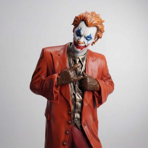 figure clown en fibre de verre, style réaliste, maquillage blanc/bleu/rouge, costume orange et gants bruns, déco ou publicité